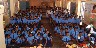 Assembled school children and their parents