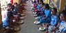 Children enoying a day's meal with parents