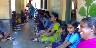 Children enoying a day's meal with parents